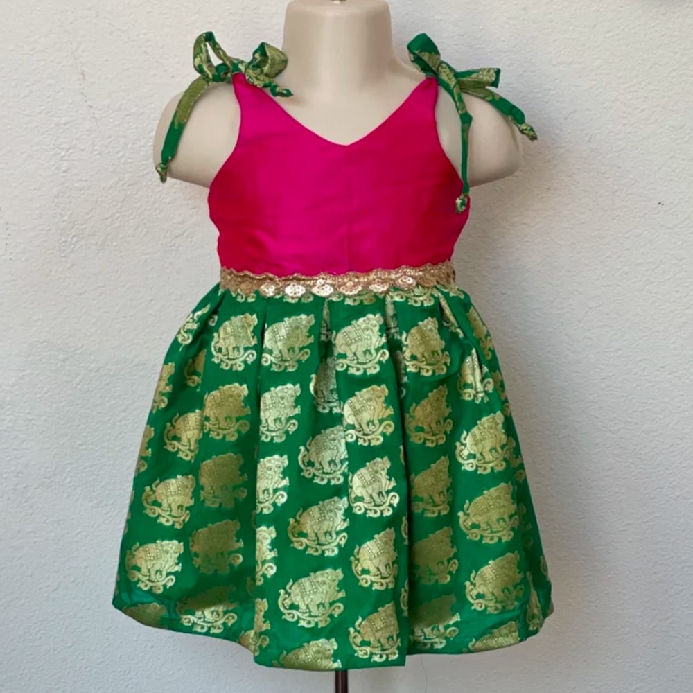 Vibrant Pink and Green Dress with Gold Accents